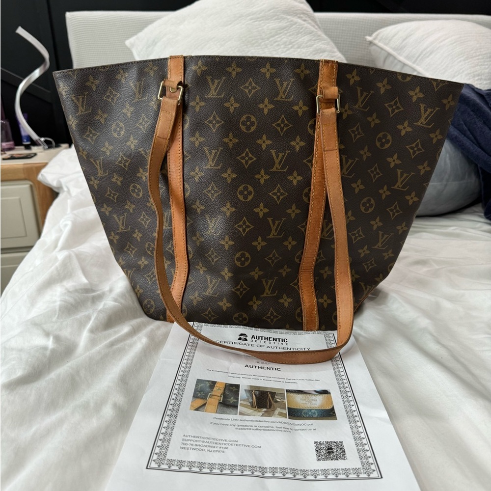 Authentic Louis Vuitton Large Purse Used Pre owned condition with flaws vintage